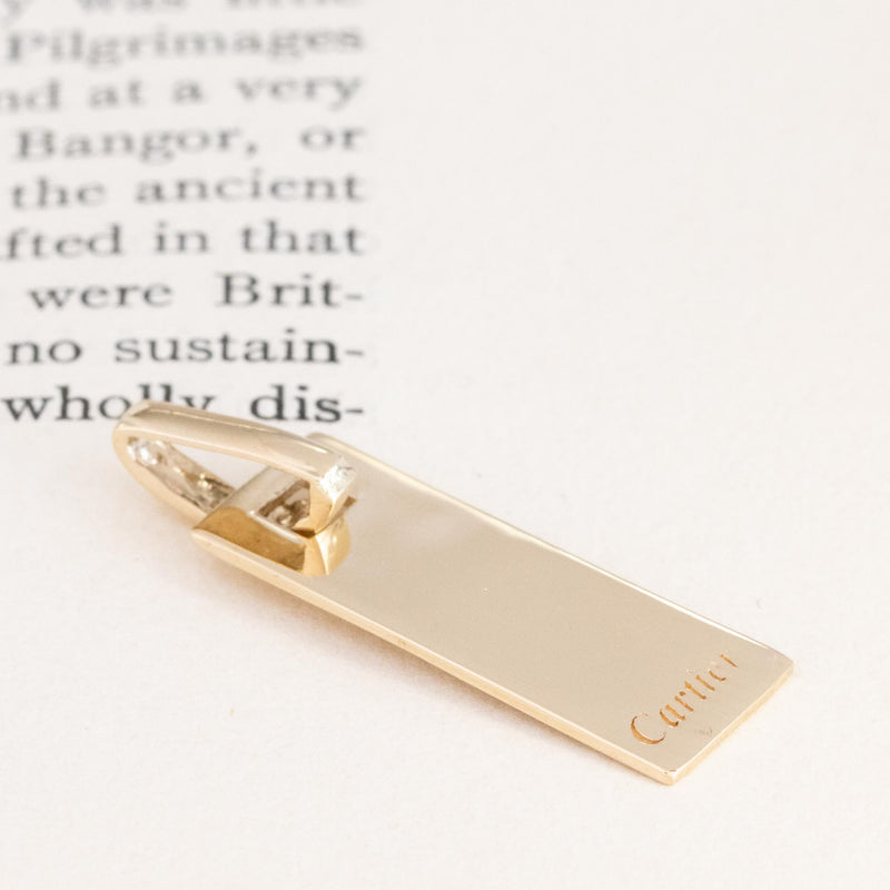 Dog Tag Pendant, by Cartier