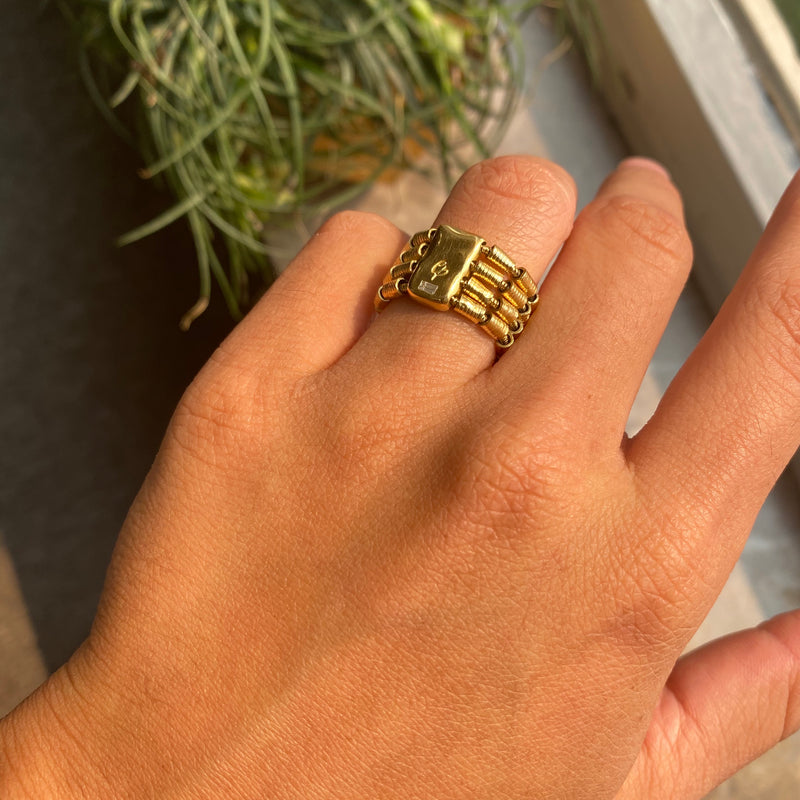 Yellow Gold and Baguette Coil Band