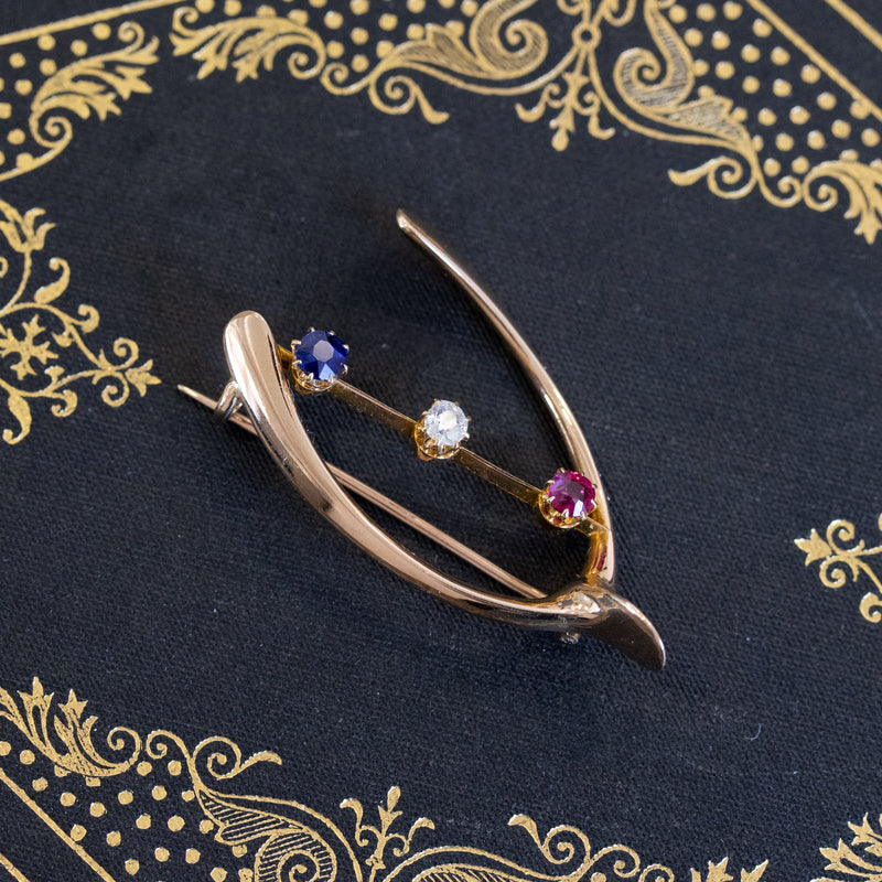Victorian Diamond, Ruby, and Sapphire Wishbone Brooch
